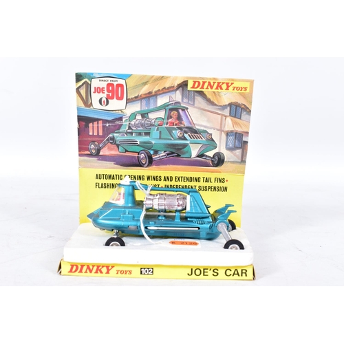 135 - A BOXED DINKY TOYS JOE 90 JOE'S CAR, No.102, missing flashing exhaust bulb but otherwise appears com... 