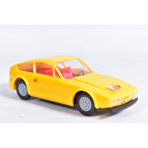 88 - AN UNBOXED BANDAI TINPLATE BATTERY OPERATED FERRARI 275 GT, orange body, red, white and blue interio... 