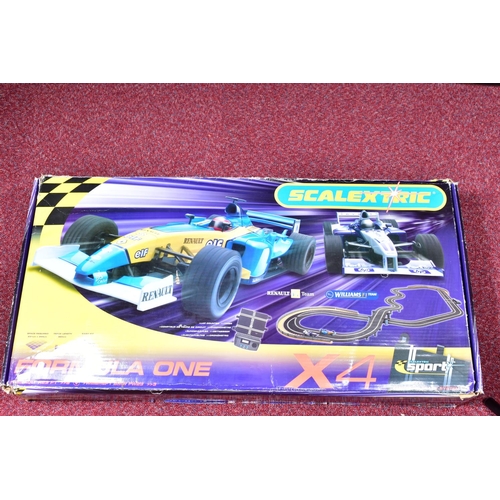 94 - TWO BOXED SCALEXTRIC FORMULA ONE MOTOR RACING SETS, one (C741) is complete with both cars, Lotus 98T... 