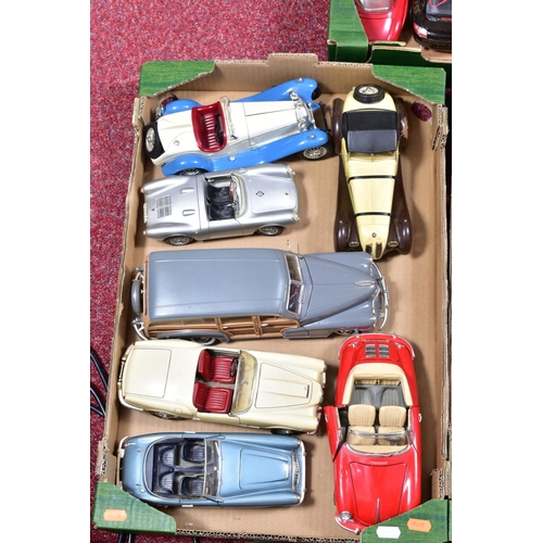 200 - A QUANTITY OF UNBOXED AND ASSORTED MODERN DIECAST AND PLASTIC CAR AND MOTORCYCLE MODELS, mainly 1/18... 