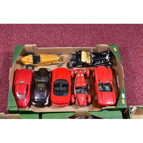 200 - A QUANTITY OF UNBOXED AND ASSORTED MODERN DIECAST AND PLASTIC CAR AND MOTORCYCLE MODELS, mainly 1/18... 