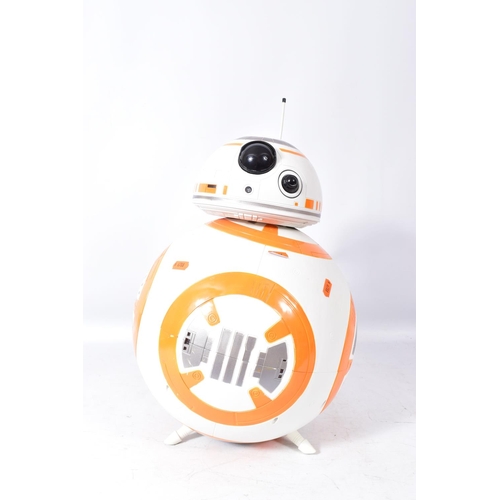 221 - A THINKWAY STAR WARS INTERACTIVE BB-8 DROID, REMOTE AND TWO OTHERS, the first moving at time of cata... 