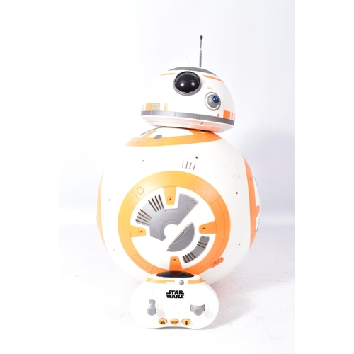 221 - A THINKWAY STAR WARS INTERACTIVE BB-8 DROID, REMOTE AND TWO OTHERS, the first moving at time of cata... 