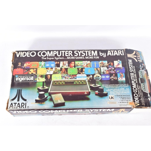 305 - A BOXED ATARI 2600, BOXED ATARI 2600 GAMES AND A TELESPORT GAME CONSOLE, boxed games include Space I... 