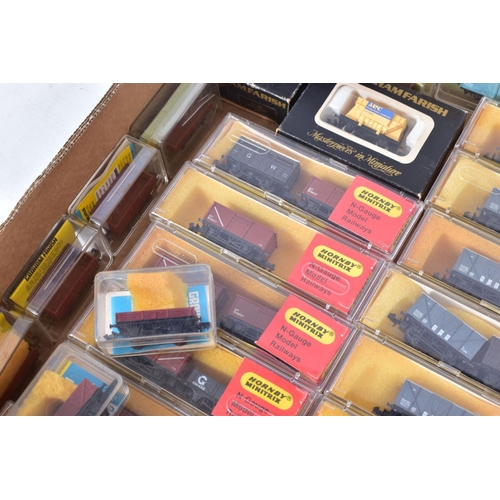 378 - A QUANTITY OF BOXED HORNBY MINITRIX AND GRAHAM FARISH N GAUGE FREIGHT ROLLING STOCK,  all appear com... 