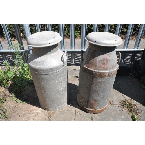 1014 - A PAIR OF GALVANISED MILK CHURNS (condition:-one slightly rusted)