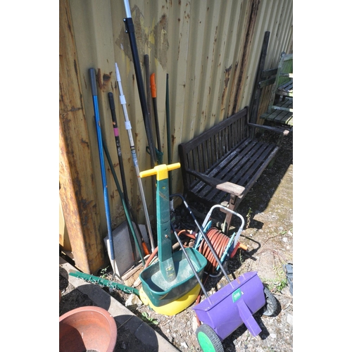 1019 - A SELECTION OF GARDEN HAND TOOLS, to include rakes, brushes, loppers, etc, along with a hose reel wi... 