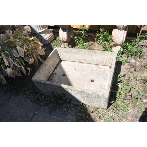 1023 - A RECTANGULAR COMPOSITE GARDEN PLANTER, length 74cm x depth 56cm x height 23cm