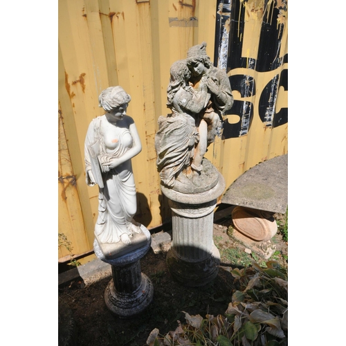 1024 - A WEATHERED COMPOSITE CLASSICAL GARDEN FIGURE, of a Romeo and Juliet, on a separate column, height 1... 