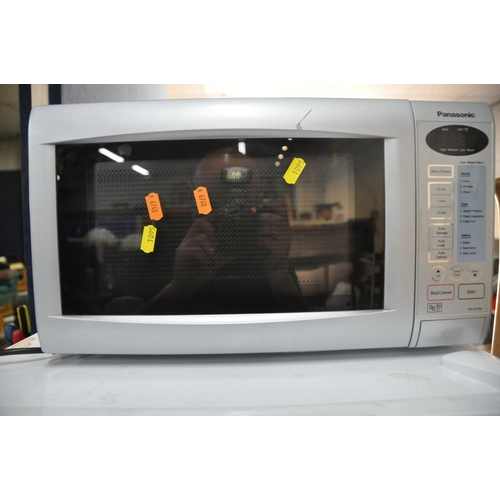 1095 - A BEKO FFG1545W TALL FREEZER along with a Panasonic NN-E225M microwave (both PAT pass and working) (... 