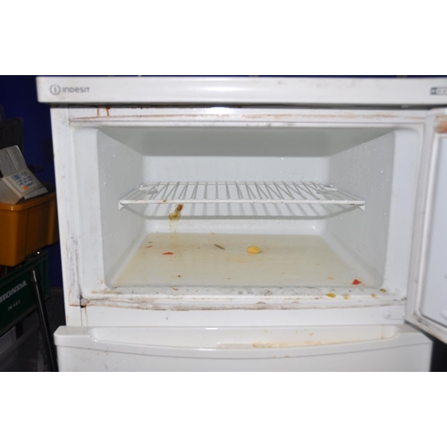 1103 - A INDESIT RG2250W FRIDGE FREEZER (condition-very dirty some mould) (PAT pass and working)