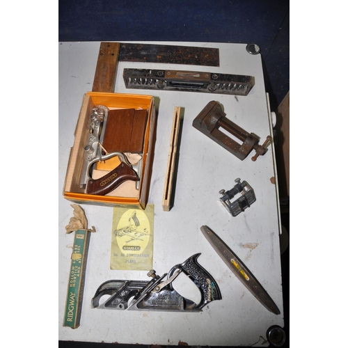 1108 - A COLLECTION OF VINTAGE TOOLS to include a Stanley No 50 combination plane in original box with inst... 