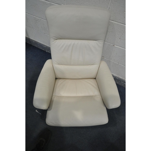 1202 - A CREAM LEATHER EKORNES STRESSLESS SWIVEL RECLINING ARMCHAIR, on a beech frame, and a matching foot ... 