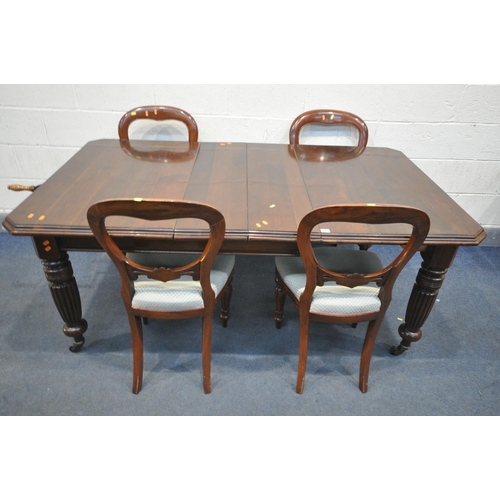 1205 - A VICTORIAN MAHOGANY WIND OUT DINING TABLE, with canted corners, two additional leaves, on fluted le... 