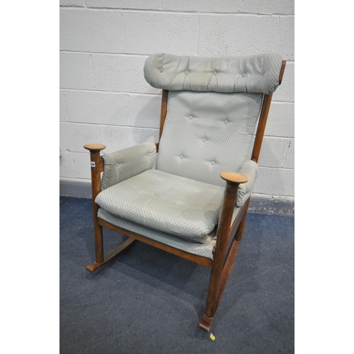 1209 - A MID CENTURY PARKER KNOLL MODEL PK 1031/4 TEAK ROCKING CHAIR (condition:-torn upholstered seat, and... 