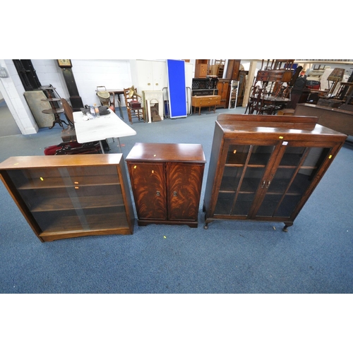 1211 - AN OAK GLAZED TWO DOOR BOOKCASE, width 92cm x depth 33cm x height 111cm (key) along with a teak glaz... 