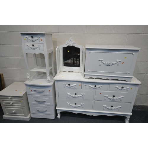 1218 - A MATCHING WHITE BEDROOM SUITE, to include a sideboard/chest of seven drawers, width 135cm x depth 4... 