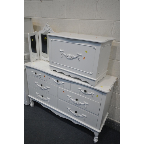 1218 - A MATCHING WHITE BEDROOM SUITE, to include a sideboard/chest of seven drawers, width 135cm x depth 4... 