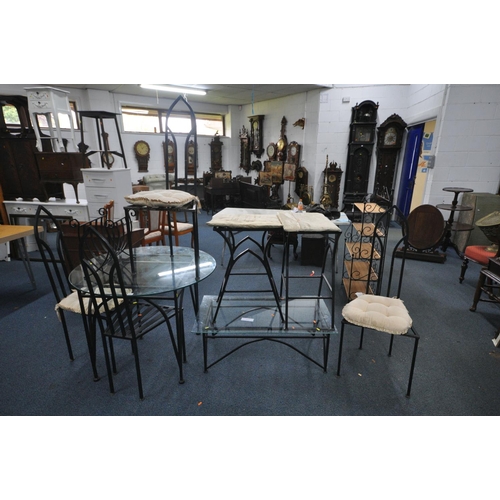 1221 - A SELECTION OF WROUGHT IRON FURNITURE, to include a circular glass top dining table, diameter 100cm ... 