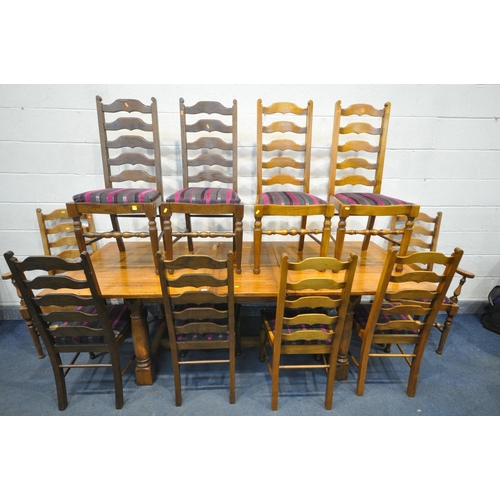 1225 - A REPRODUCTION OAK DRAW LEAF DINING TABLE, one additional leaf, along with a set of six ladder back ... 