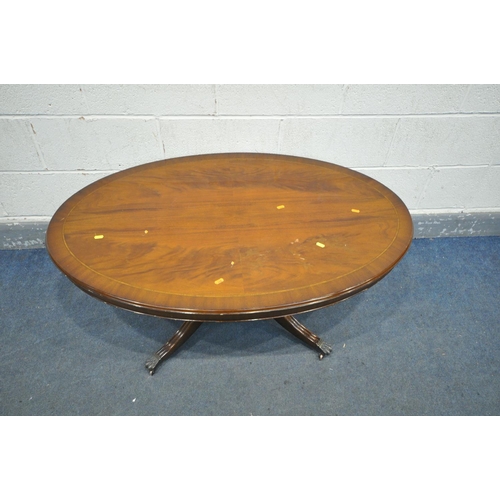 1231 - AN GILT FRAMED BEVELLED EDGE WALL MIRROR, 106cm x 75cm, an oval mahogany coffee table, and a mid-cen... 