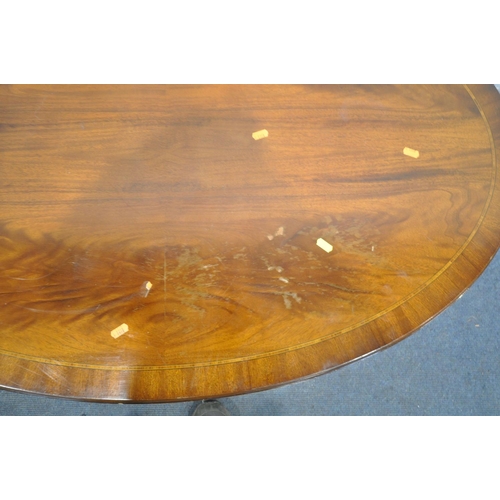 1231 - AN GILT FRAMED BEVELLED EDGE WALL MIRROR, 106cm x 75cm, an oval mahogany coffee table, and a mid-cen... 