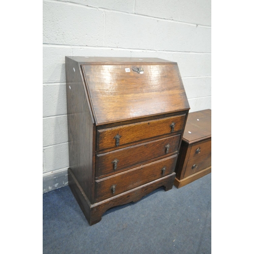 1238 - AN OAK FALL FRONT BUREAU, with fitted interior, above three graduated drawers, width 74cm x depth 44... 