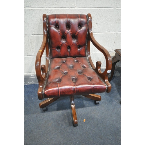 1245 - A MAHOGANY SWIVEL OFFICE CHAIR, with red buttoned leather