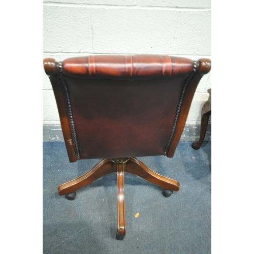 1245 - A MAHOGANY SWIVEL OFFICE CHAIR, with red buttoned leather