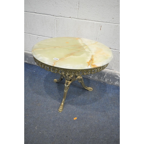 1246 - AN ONYX AND BRASS TRIPOD TABLE, diameter 60cm x height 48cm