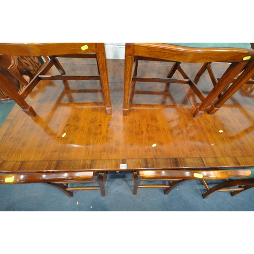 1248 - A YEW WOOD TWIN PEDESTAL DINING TABLE, with two additional leaves, open length 251cm x closed length... 