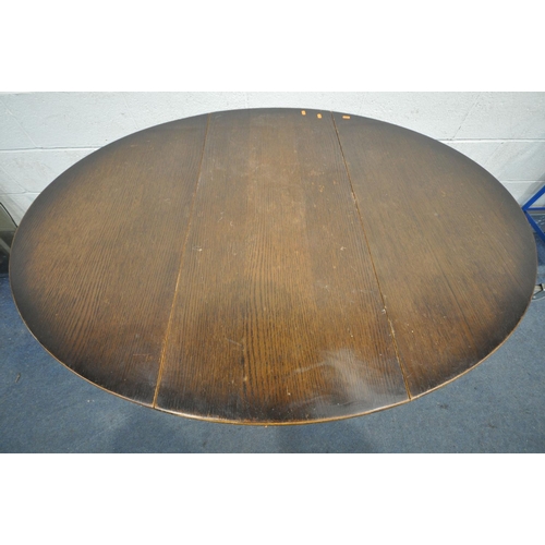 1249 - AN OVAL MAHOGANY AND INLAID COFFEE TABLE, with splayed legs, united by stretchers, length 112cm x de... 