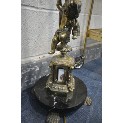 1253 - A BRASS FRENCH CHERUB STANDARD LAMP, on a circular marble base and claw feet, height to fitting 146c... 