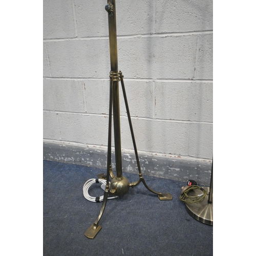 1261 - AN ARTS AND CRAFTS BRASS STANDARD LAMP, with three splayed legs (telescopic function faulty) and ano... 