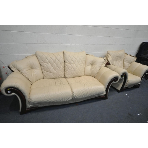 1267 - A CREAM LEATHER THREE PIECE LOUNGE SUITE, comprising a sofa, length 225cm x depth 95cm x height 93cm... 