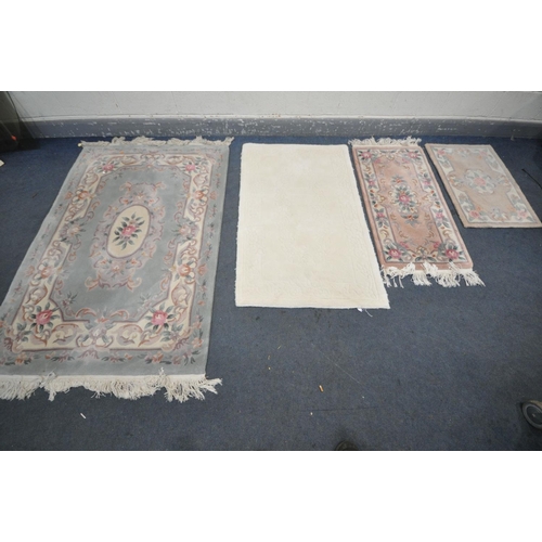 1268 - A GREEN WOOLLEN CHINESE RUG, 183cm x 123cm , two smaller Chinese rugs, and another rug (4)