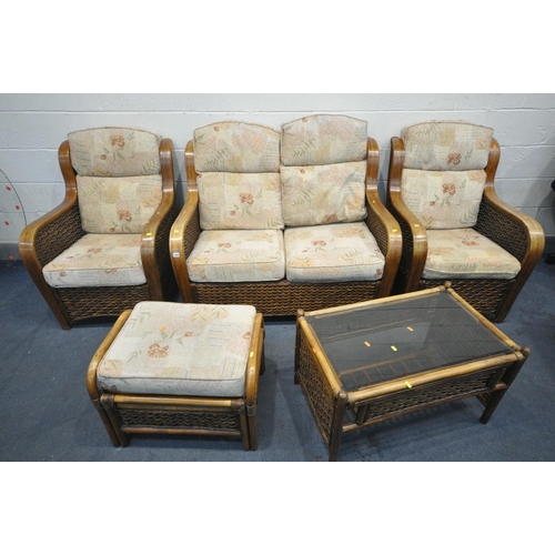 1269 - A FIVE PIECE WICKER CONSERVATORY SUITE, comprising a two seater sofa, a pair of armchairs, a pouffe,... 