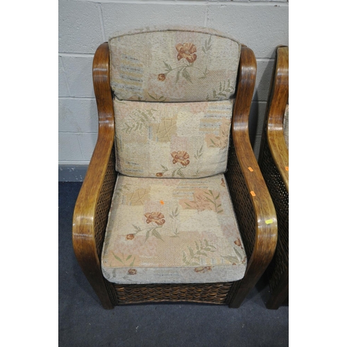 1269 - A FIVE PIECE WICKER CONSERVATORY SUITE, comprising a two seater sofa, a pair of armchairs, a pouffe,... 