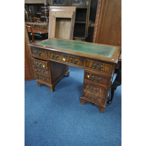 1277 - A MAHOGANY PEDESTAL DESK, with a green leather writing surface, and eight assorted drawers, width 12... 