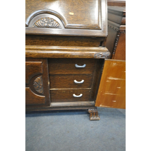 1289 - A 1940'S OAK SIDEBOARD, with three drawers, width 137cm x depth 52cm x height 103cm, and an oak bure... 