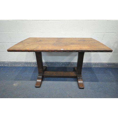 1301 - A 20TH CENTURY SOLID ELM REFECTORY TABLE, the table top that's adzed and carved geometric pattern to... 