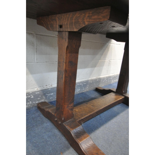 1301 - A 20TH CENTURY SOLID ELM REFECTORY TABLE, the table top that's adzed and carved geometric pattern to... 