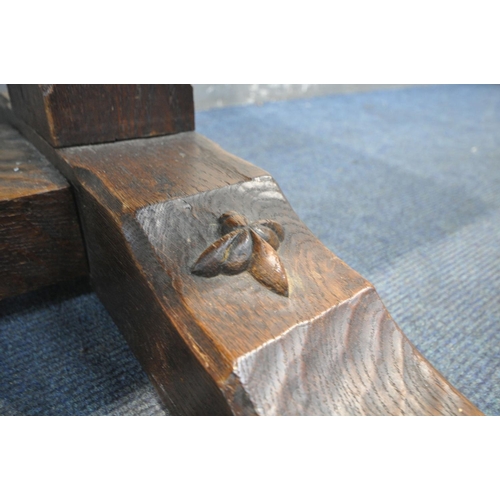 1301 - A 20TH CENTURY SOLID ELM REFECTORY TABLE, the table top that's adzed and carved geometric pattern to... 