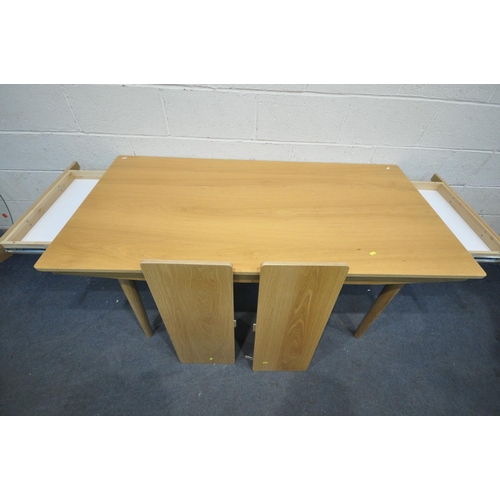 1304 - A JOHN LEWIS LIGHT OAK DINING TABLE, with two additional leaves/drawers, on cylindrical tapered legs... 