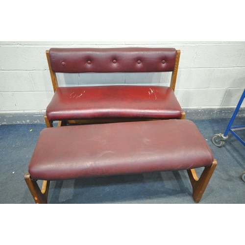 1308 - A BURGUNDY LEATHER BENCH, with pine frame, along with a matching stool (condition - tears and cracks... 