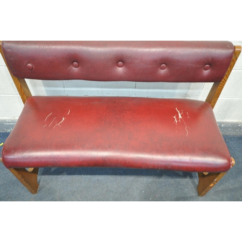 1308 - A BURGUNDY LEATHER BENCH, with pine frame, along with a matching stool (condition - tears and cracks... 