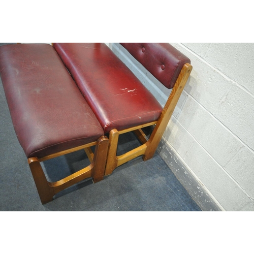 1308 - A BURGUNDY LEATHER BENCH, with pine frame, along with a matching stool (condition - tears and cracks... 