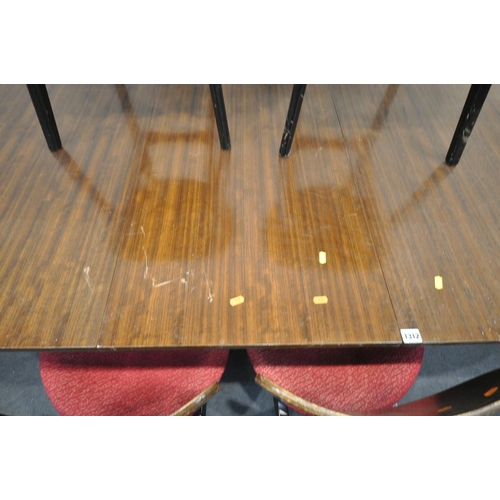 1312 - A MID CENTURY G PLAN E.GOMME TOLA AND BLACK EXTENDING DINING TABLE, with one additional leaf, extend... 