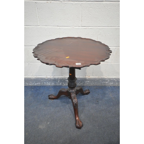 1320 - A GEORGIAN STYLE MAHOGANY TILT TOP TRIPOD TABLE, with a dish top and wavy edge, bird cage support, o... 