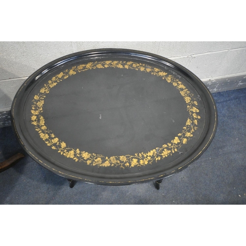 1332 - AN EBONISED AND FLORAL GILT OVAL OCCASIONAL TABLE, with a removable tray, on a faux bamboo base, wid... 